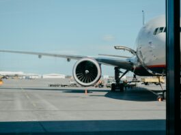 white airliner on runway